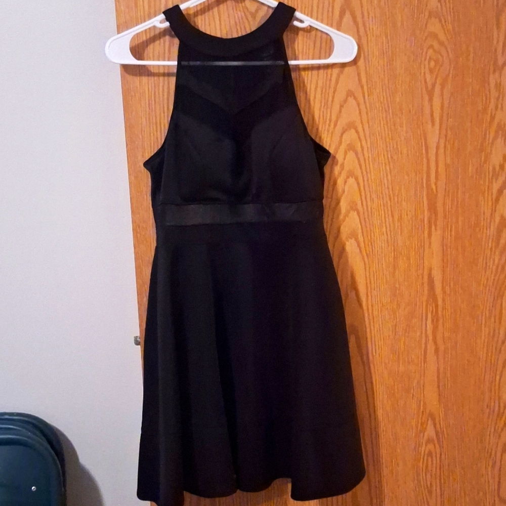 Black sleeveless party dress.